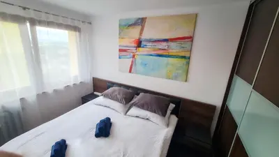 Łóżko lub łóżka w pokoju w obiekcie Peters Loft