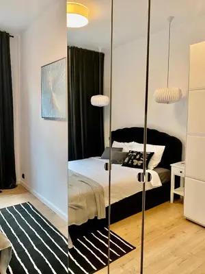Łóżko lub łóżka w pokoju w obiekcie Jan III Sobieski - Luksusowy apartament L z darmowym prywatnym parkingiem