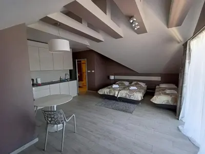 Łóżko lub łóżka w pokoju w obiekcie Apartament Tignes Czarna Góra