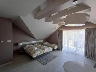 Łóżko lub łóżka w pokoju w obiekcie Apartament Tignes Czarna Góra
