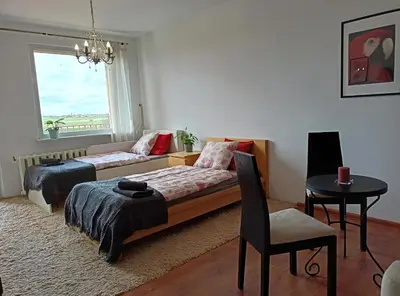 Łóżko lub łóżka w pokoju w obiekcie Przytulny pokój blisko autostrady S3 i 6 min od Rynku
