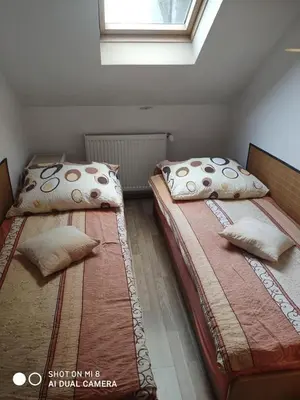Łóżko lub łóżka w pokoju w obiekcie Agroturystyka Patynówka