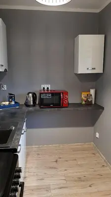 Kuchnia lub aneks kuchenny w obiekcie Apartament Kilińskiego