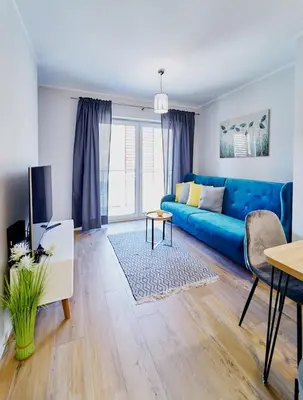 Telewizja i/lub zestaw kina domowego w obiekcie LAGUNA Apartament Polanica Residence 38 z garażem SPA