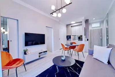 Telewizja i/lub zestaw kina domowego w obiekcie LAGUNA Apartament Polanica Residence 3
