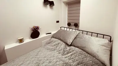 Łóżko lub łóżka w pokoju w obiekcie Domek Zielone Centrum