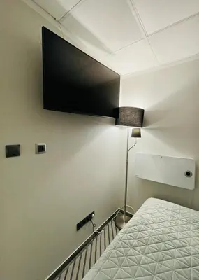 Telewizja i/lub zestaw kina domowego w obiekcie Domek Zielone Centrum