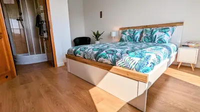 Łóżko lub łóżka w pokoju w obiekcie Słoneczna Przystań - Apartament
