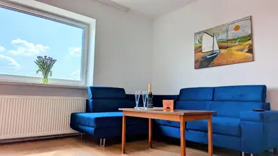 Część wypoczynkowa w obiekcie Słoneczna Przystań - Apartament