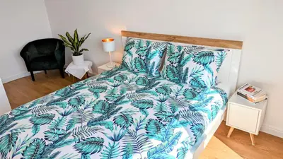 Łóżko lub łóżka w pokoju w obiekcie Słoneczna Przystań - Apartament