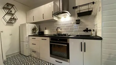 Kuchnia lub aneks kuchenny w obiekcie Apartament Kamienica