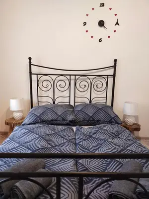 Łóżko lub łóżka w pokoju w obiekcie Apartament Przy rynku