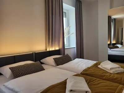 Łóżko lub łóżka w pokoju w obiekcie Good Sleep