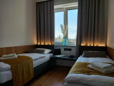 Łóżko lub łóżka w pokoju w obiekcie Good Sleep
