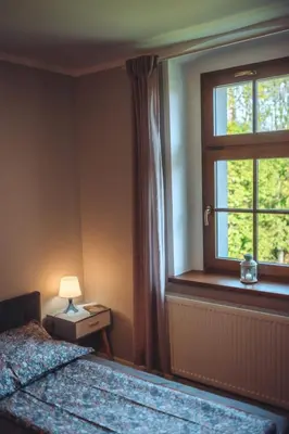 Łóżko lub łóżka w pokoju w obiekcie Chata w Stołowych