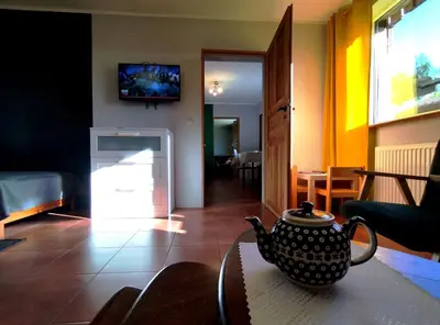 Telewizja i/lub zestaw kina domowego w obiekcie Domek w górach