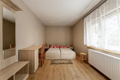 Łóżko lub łóżka w pokoju w obiekcie Sudecki Domek