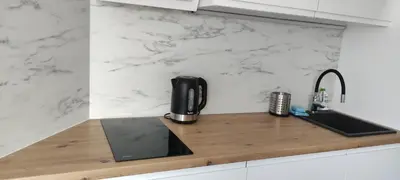 Kuchnia lub aneks kuchenny w obiekcie Apartamenty Pod Lasem