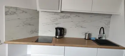 Kuchnia lub aneks kuchenny w obiekcie Apartamenty Pod Lasem