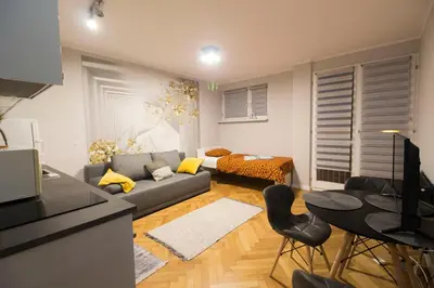 Telewizja i/lub zestaw kina domowego w obiekcie HAPPYESTATE ul Wita Stwosza Old Town