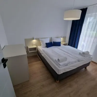 Łóżko lub łóżka w pokoju w obiekcie Apartamenty Boczna 3B z sauną i balią
