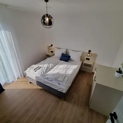 Łóżko lub łóżka w pokoju w obiekcie Apartamenty Boczna 3B z sauną i balią