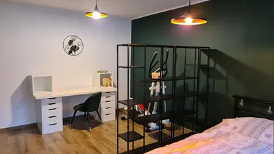 Łóżko lub łóżka w pokoju w obiekcie Spokojny Wypoczynek 5