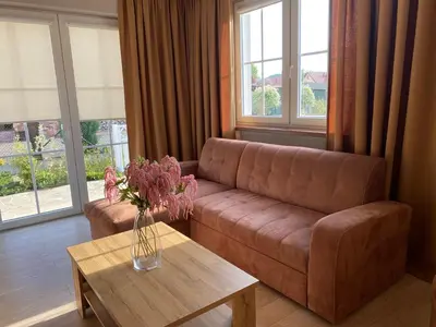 Część wypoczynkowa w obiekcie Apartament Caminski Dębowa