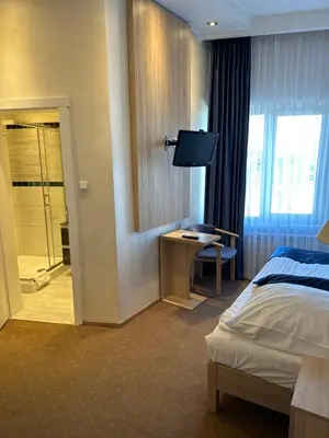 Łóżko lub łóżka w pokoju w obiekcie Diament i Brylant