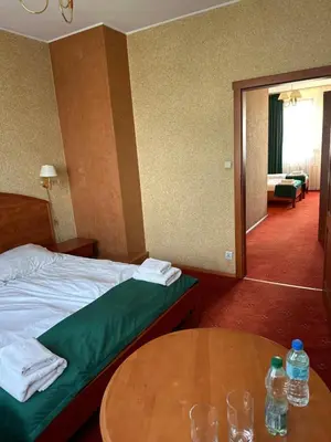 Łóżko lub łóżka w pokoju w obiekcie Diament i Brylant