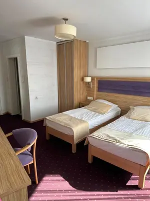 Łóżko lub łóżka w pokoju w obiekcie Diament i Brylant