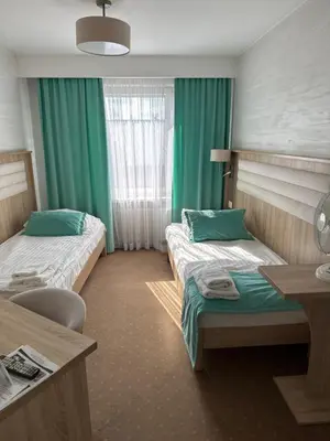 Łóżko lub łóżka w pokoju w obiekcie Diament i Brylant