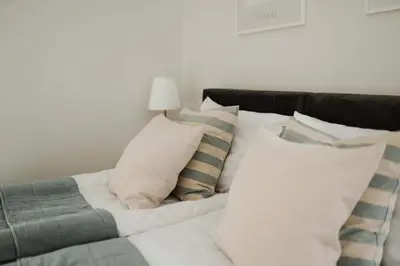Łóżko lub łóżka w pokoju w obiekcie Villa Adele