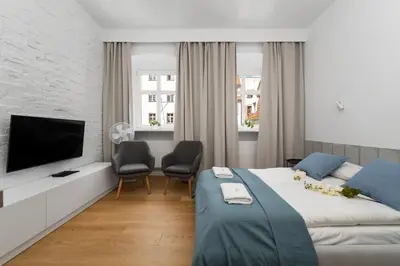Telewizja i/lub zestaw kina domowego w obiekcie Old Town Studio by Noclegi Renters