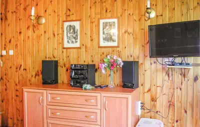 Telewizja i/lub zestaw kina domowego w obiekcie Holiday Home Sobòtka Pod Debami