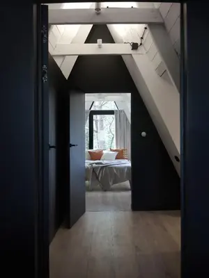Łóżko lub łóżka w pokoju w obiekcie Domek Modern BRDA