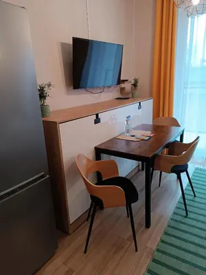 Telewizja i/lub zestaw kina domowego w obiekcie Sleep In Apartament Centrum