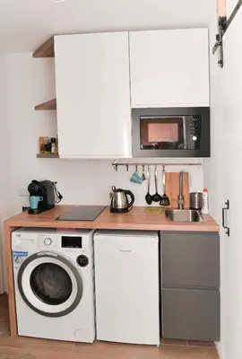 Kuchnia lub aneks kuchenny w obiekcie Apartament przy deptaku i Parku Zdrojowym - Polanica Zdrój