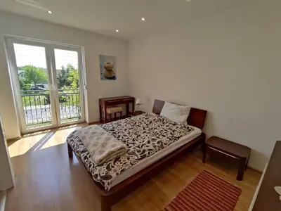 Łóżko lub łóżka w pokoju w obiekcie Apartament GórnyŚląsk blisko jeziora - 120qm - 3 sypialnie z parkingiem i klimatyzacją - Flat UpperSilesia with Parking & air conditioning - Ferienwohnung OberSchlesien mit 3 Schlafzimmern inklusive Parkplatz und Klima - Nähe Badesee und Sandstrand