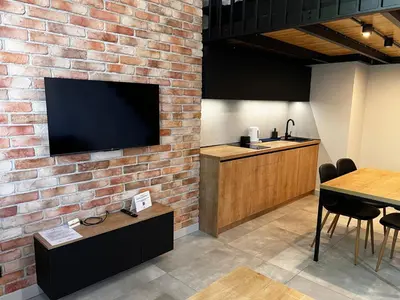 Telewizja i/lub zestaw kina domowego w obiekcie Property Apart - plac Jana Pawla II Centrum
