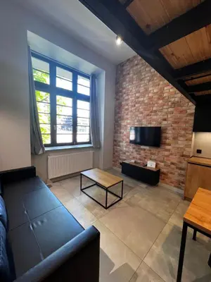 Telewizja i/lub zestaw kina domowego w obiekcie Property Apart - plac Jana Pawla II Centrum