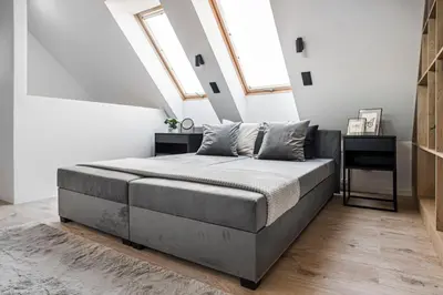Łóżko lub łóżka w pokoju w obiekcie AS-HOME Dwupoziomowy apartament przy Dworcu PKP PARKING FREE