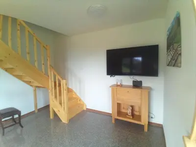 Telewizja i/lub zestaw kina domowego w obiekcie Maślany Domek