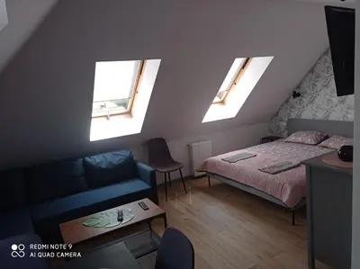 Łóżko lub łóżka w pokoju w obiekcie Apartamenty Brzozowe Zacisze