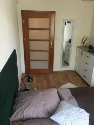 Łóżko lub łóżka w pokoju w obiekcie Apartament M