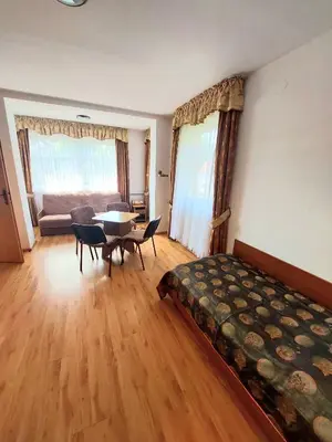 Łóżko lub łóżka w pokoju w obiekcie Marel-Apartments U SOWY- Park- Polanica Zdrój