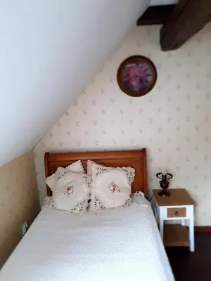 Łóżko lub łóżka w pokoju w obiekcie Dom Czarnów 6