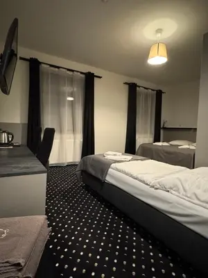 Łóżko lub łóżka w pokoju w obiekcie Medical Wellness & SPA Werona