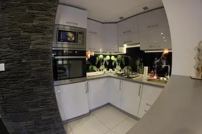 Kuchnia lub aneks kuchenny w obiekcie Black & White Komfortowe Apartamenty 2 km od Centrum
