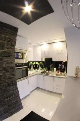 Kuchnia lub aneks kuchenny w obiekcie Black & White Komfortowe Apartamenty 2 km od Centrum